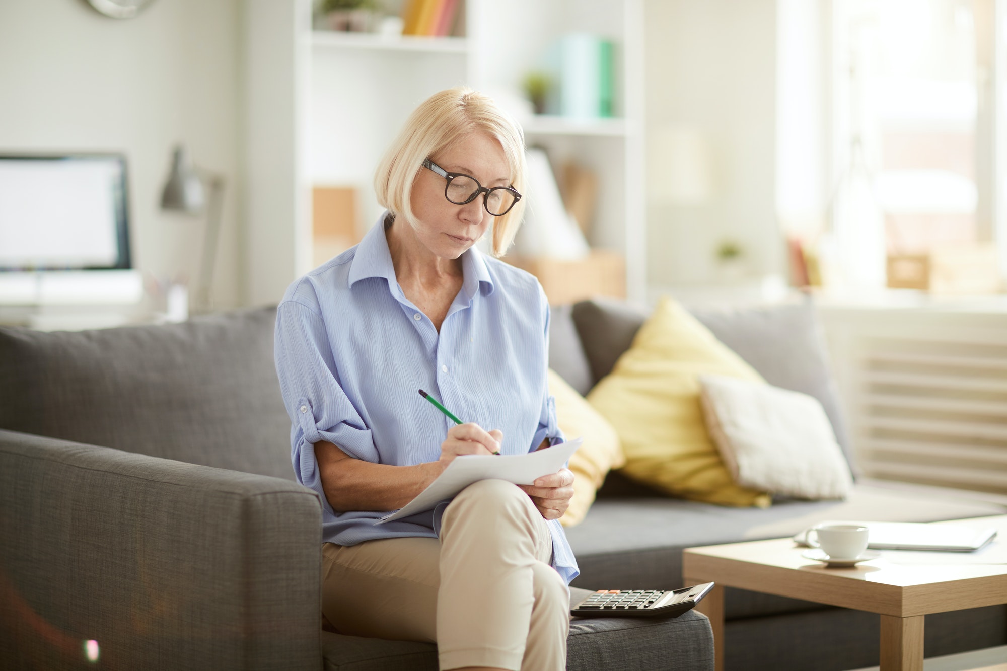 Senior Woman Calculating Finances